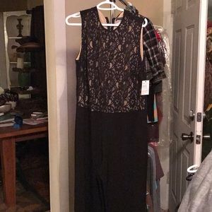 Black jumpsuit. Upper bodice lace wide leg pant